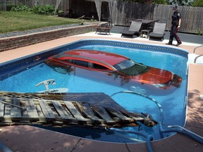 A car has plunged into a backyard pool in Riverside. (Nick Brancaccio/The Windsor Star)