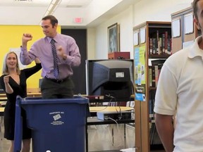A still image from the YouTube video "Teachers Dancing Behind Students - ACS Edition."