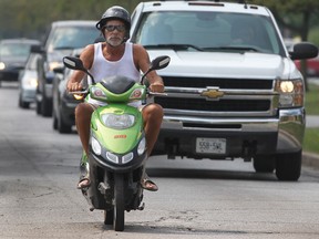 An unidentified e-bike rider is seen in this file photo. (Dan Janisse / The Windsor Star)