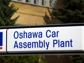 The sign at the General Motors assembly plant in Oshawa, Ont. is seen in this August 2011 file photo. (Brent Lewin / Bloomberg)
