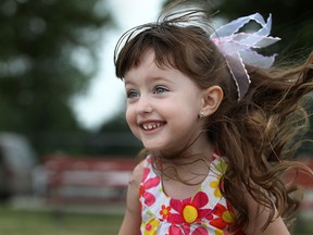 Lily Woodall, 3, has fun while at Trixie's Father's Day Weekend Mini Golf and Driving Range Fundraiser for Lily at Silver Tee Golf, Sunday, June 17, 2012. (DAX MELMER/The Windsor Star)