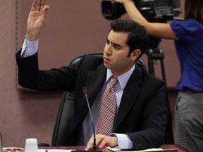 Ward 10 councillor Al Maghnieh in his seat at City Hall. Photographed May 28, 2012. (Tyler Brownbridge / The Windsor Star)