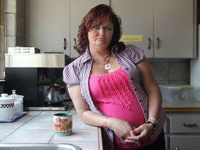Shelly Bath, a client at The Well-Come Centre, an emergency shelter for women experiencing homelessness, is pictured in the centre's kitchen, Wednesday, June 20, 2012.     (DAX MELMER/The Windsor Star)