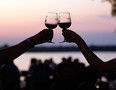 Files: A man and woman toast with wine glasses at the Shores of Erie Wine Festival held at Fort Malden in Amherstburg, Ont., in this file photo.  (JASON KRYK/The Windsor Star)