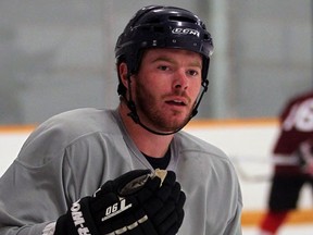 Essex native Ryan Green takes a break during a scrimmage at Tecumseh Arena Monday. (NICK BRANCACCIO/The Windsor Star)