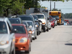 Commuters cause some congestion on Daytona Avenue, heading North due to lane closures on Huron Church Road at Malden Road, Friday, July 20, 2012. The north bound lane on Huron Church Road between Malden Road and Tecumseh Road West has been reduced to one lane to due to part of the road buckling north of Totten Avenue.(DAX MELMER/The Windsor Star)