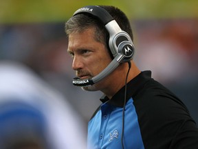 Lions coach Jim Schwartz leads his team on to the field against the Denver Broncos during pre-season NFL action in 2010. (DOUG PENSINGER/Getty Images)