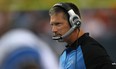 Lions coach Jim Schwartz leads his team on to the field against the Denver Broncos during pre-season NFL action in 2010. (DOUG PENSINGER/Getty Images)