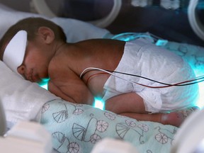 Mohammed Elkafarneh sleeps at the Windsor Regional Hospital in Windsor on Friday, July 20, 2012. Reema Elkafarneh gave birth to four babies, three boys and one girl, last Friday. Ahmed, Mohammed, Mohanad and Dana are all doing fine. (The Windsor Star / TYLER BROWNBRIDGE)