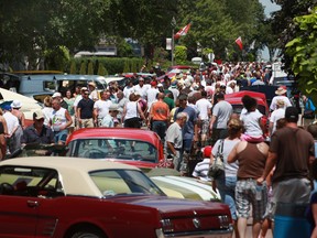 Hundreds of people walk down Dalhousie Street admiring the rows of classic cars at the Amherstburg's "Gone Car Crazy" Show, Sunday, July 29, 2012. (DAX MELMER/The Windsor Star)