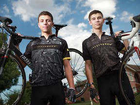 Michele D'Agnillo, 16, left, and Andrei Enache, 16, are pictured on the eve of their trip to Ottawa, Ont., where they will be bicycling back to Windsor to raise money for cancer research, Saturday, July 28, 2012. (DAX MELMER/The Windsor Star)