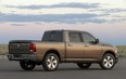 This undated file photo originally released by Chysler shows the 2009 Dodge Ram 1500. A government agency is investigating safety problems with two vehicles made by Chrysler, the Ram pickup truck and Jeep Grand Cherokee SUV. The rear wheels can lock up in Rams from the 2009 and 2010 model years, potentially causing crashes, while power steering fluid hoses can leak in 2012 Grand Cherokees, possibly causing engine fires, according to documents posted Monday, July 23, 2012, on the National Highway Traffic Safety Administration website.(AP Photo/Chysler, file)