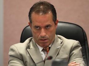 Windsor councillor Bill Marra glares down during the city council meeting Monday, July 9, 2012, in Windsor, Ont. (Windsor Star / DAN JANISSE)