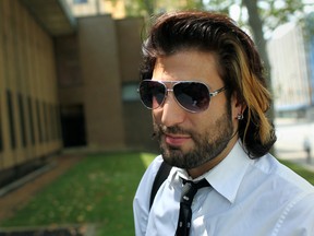 Rock musician Daniel Victor - the man behind the Neverending White Lights recording project - is shown outside a courthouse in Windsor, Ont. on July 27, 2012. (Dax Melmer / The Windsor Star)