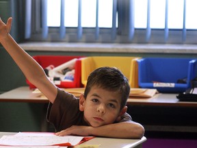 Noah Atkins, a student at Our Lady of Perpetual Help school in Windsor participates in a classroom exercise in this file photo. (DAN JANISSE/The Windsor Star)