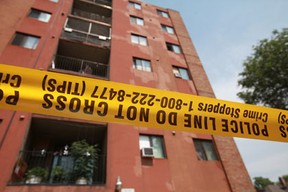 Police tape at the scene at 525 Wyandotte St. West, where a boy fell from a fifth-floor apartment window on July 5, 2012. (Dax Melmer / The Windsor Star)