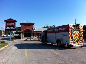Investigators are probing a blaze which broke out the Midtown Bar & Grill at 3560 Walker Rd. on Thursday, July 12, 2012. (TYLER BROWNBRIDGE/The Windsor Star)