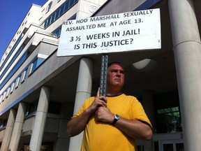 Sexual abuse victim Patrick McMahon protests outside the Ontario Court of Justice on July 20 2012.    (Windsor Star photo).