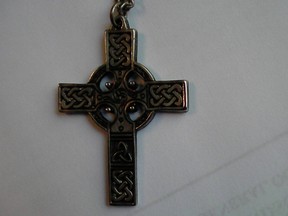 The Celtic cross pendant that Windsor police recovered from the scene of a break-in at a massage "spa" in the 1000 block of Wyandotte Street West in the early hours of July 14, 2012. (Handout / The Windsor Star)