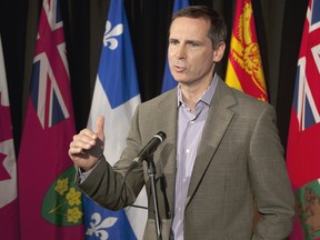 Ontario Premier Dalton McGuinty fields questions at the annual Council of the Federation meeting in Halifax on Thursday, July 26, 2012. (THE CANADIAN PRESS/Andrew Vaughan)