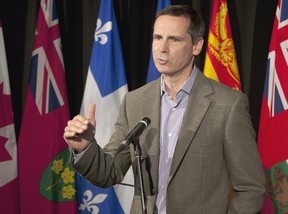 Ontario Premier Dalton McGuinty fields questions at the annual Council of the Federation meeting in Halifax on Thursday, July 26, 2012. (THE CANADIAN PRESS/Andrew Vaughan)