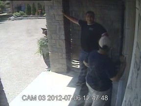 A surveillance camera image of two "persons of interest" in two break-and-enter crimes in the Lakeshore area on July 6, 2012. (Image provided by Lakeshore OPP)