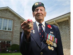 Ralph Mayville of the 1st Special Service Force - The Devil's Brigade, is shown outside his Windsor, Ont. home, Sunday, July 8, 2012. Mayville will be awarded the Congressional Gold Medal at the Spearhead reunion in Washington D.C. (DAX MELMER/ The Windsor Star)