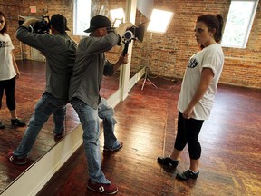 Jon Gillies films Barbara Sadai at Xtreme Dance Works in Windsor, Ont., on Tuesday, July 31, 2012. The shoot was part of a project by the Bulimia Anorexia Nervosa Association and local teens who are creating an inspirational music video that deals with body image and self esteem. (The Windsor Star / TYLER BROWNBRIDGE)