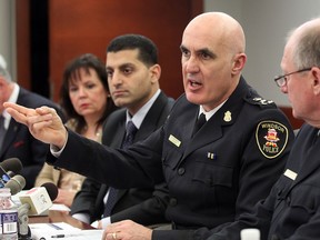 Windsor Acting Police Chief Al Frederick, centre right, gestures during a press conference in this 2012 file photo.  From left, Toni Scislowski, vice chair of Windsor Police Services Board,  Mayor Eddie Francis and Deputy Chief Jerome Brannagan, right,  listen. (NICK BRANCACCIO/The Windsor Star)