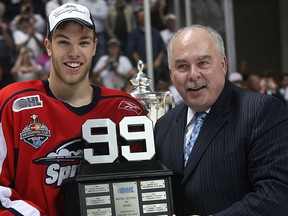 OHL commissioner Dave Branch, right, presents Windsor Spitfire Taylor Hall with the Wayne Gretzky trophy for the most valuable player in the playoffs in 2009. (DAN JANISSE/The Windsor Star)
