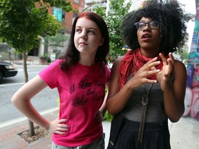 Adriana Unis, left, of Windsor, Ont. speaks with Jouvon Evans near Windsor Pride on Pelissier Street Aug. 15, 2012,  (NICK BRANCACCIO/The Windsor Star)