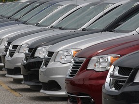 A row of 2011 Dodge Grand Caravans are seen in this file photo. (Dan Janisse/The Windsor Star)