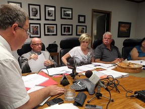 Peter Frise, left, Chair of the Library Board, Chris Woodrow, Acting CEO, Judie Lowery, administrative assistant, Percy Hatfield, board member, and Lorena Shepley, board member, during library board meeting June 26, 2012. (NICK BRANCACCIO/The Windsor Star)