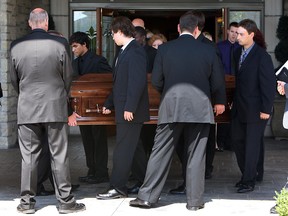 Matthew Rawlings casket is carried to a waiting hearse at Families First Funeral Home in Windsor on Friday, August 24, 2012. Eighteen year old Rawlings died suddenly last Sunday. (The Windsor Star / TYLER BROWNBRIDGE)