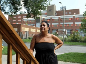 Lilly Mergl is shown in front of her house which faces the former Grace hospital site in Windsor, Ont. on Wednesday, Aug. 15, 2012. (The Windsor Star / TYLER BROWNBRIDGE)