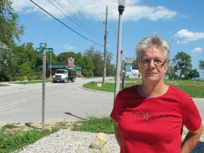 Maureen Beauvais has had enough of the trucks rumbling down Park Street at all hours of the day and night. She is one of dozens of residents complaining about various issues in the Kingsville neighbourhood. (The Windsor Star/Sarah Sachelli)
