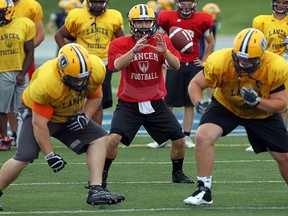 The University of Windsor Lancers football team takes part in an open football camp at Alumni Field in Windsor, Ont. on Monday, Aug. 20, 2012. (The Windsor Star / TYLER BROWNBRIDGE)