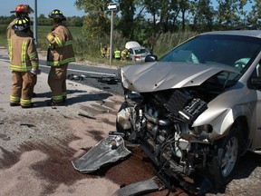 A minivan involved in a collision with a Chevy Cruze sits at Highway 3 and Malden Road in Tecumseh, Ont., Thursday, August 30, 2012.  (DAX MELMER/The Windsor Star)