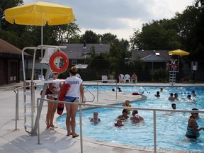 Lifeguards stand watch at Riverside Centennial Pool in this file photo. (Ben Nelms/The Windsor Star)