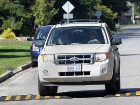 Experimental speed cushions have been installed on Bartlet Drive in South Windsor, Ont. Here, a motorist drives over the cushions Thursday, Aug. 23, 2012.   (DAN JANISSE/ The Windsor Star)
