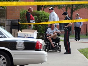 Windsor police conduct an investigation following a stabbing of a 28-year-old man at The Salvation Army, 355 Church St., Monday Aug.t 20, 2012.  (NICK BRANCACCIO/The Windsor Star)