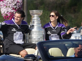 L.A. Kings player Kevin Westgarth and his wife Meagan arrive at the United Communities Credit Union complex in Amherstburg, Ont. Tuesday, Aug. 21, 2012, with the Stanley Cup. Over 1,000 fans showed up to greet the Amherstburg native.  (DAN JANISSE/ The Windsor Star)