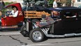 Cars participate at the 18th annual Woodward Dream Cruise on Saturday, Aug. 18, 2012 in Ferndale, Mich. (AP Photo/Detroit Free Press, Jessica J. Trevino)
