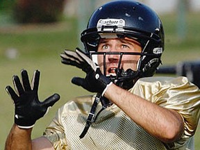 AKO receiver Joel Archer catches a pass during practice at AKO Park. (NICK BRANCACCIO/The Windsor Star)