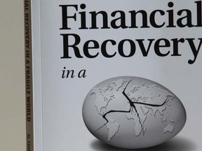 Financial Recovery in a Fragile World is written by Al Emid and Robert Ironside with Evelyn Jacks and is published by Knowledge Bureau. (Jason Kryk / The Windsor Star)