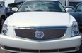 The front grill of a 2006 white Cadillac DTS is seen in this undated file photo.
