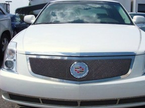 The front grill of a 2006 white Cadillac DTS is seen in this undated file photo.