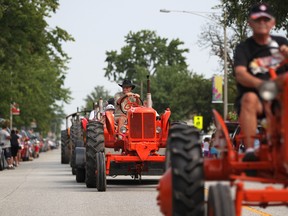 In this 2011 file photo, a row of tractors make their way through a parade for the 152nd annual Comber fair. (DAX MELMER / The Windsor Star)