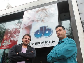Justin Elias (L) and Joe Busico (R) of Fresh Beatz Productions pose in front of their favourite venue, the Boom Boom Room in downtown Windsor, Ont. Photographed Aug. 14, 2012. (Jason Kryk / The Windsor Star)
