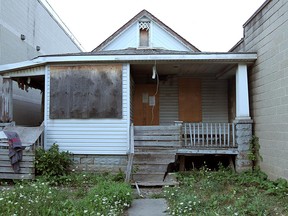 A derelict home at 546 Aylmer Ave. - one of four properties slated for demolition by the city's building department. Photographed in Windsor, Ont. on Aug. 7, 2012. (Tyler Brownbridge / The Windsor Star)